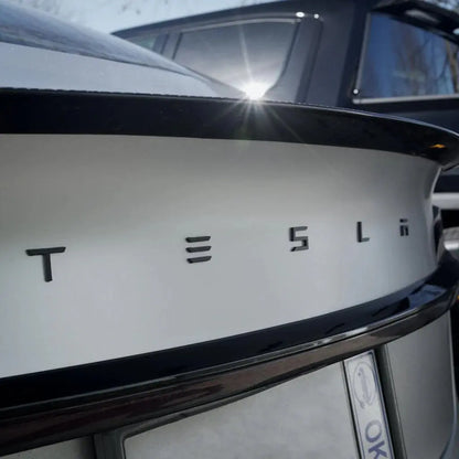 Tesla Emblem Bag, Sort højglans - BilligStyling